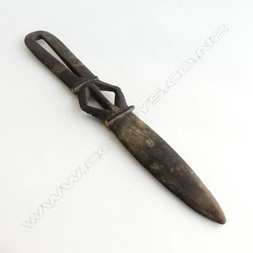 A dark wooden spatula type knife, Image 1++